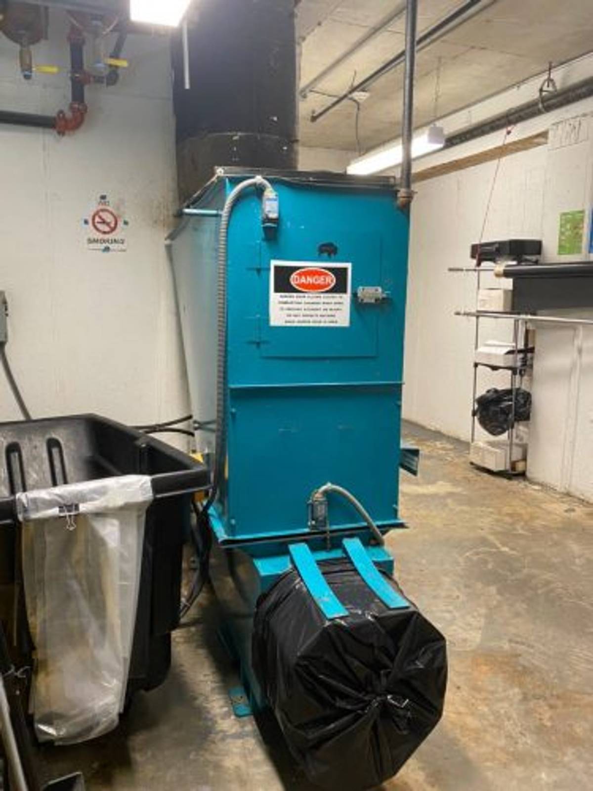 Compactor Chute Dusting Machine Example